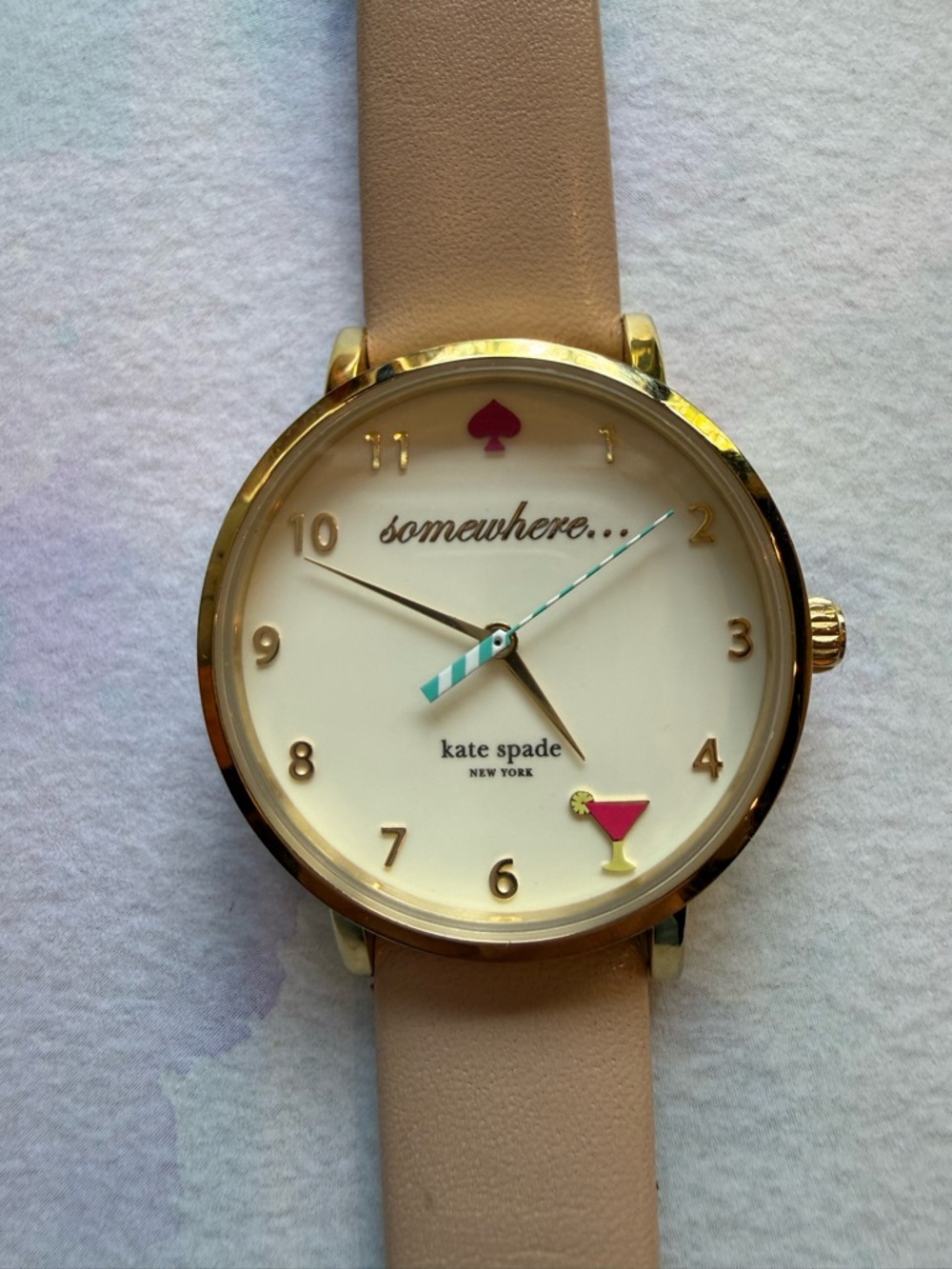 kate spade Gold Tone “It’s 5:00 somewhere” Watch with Cream Dial and Beige Strap